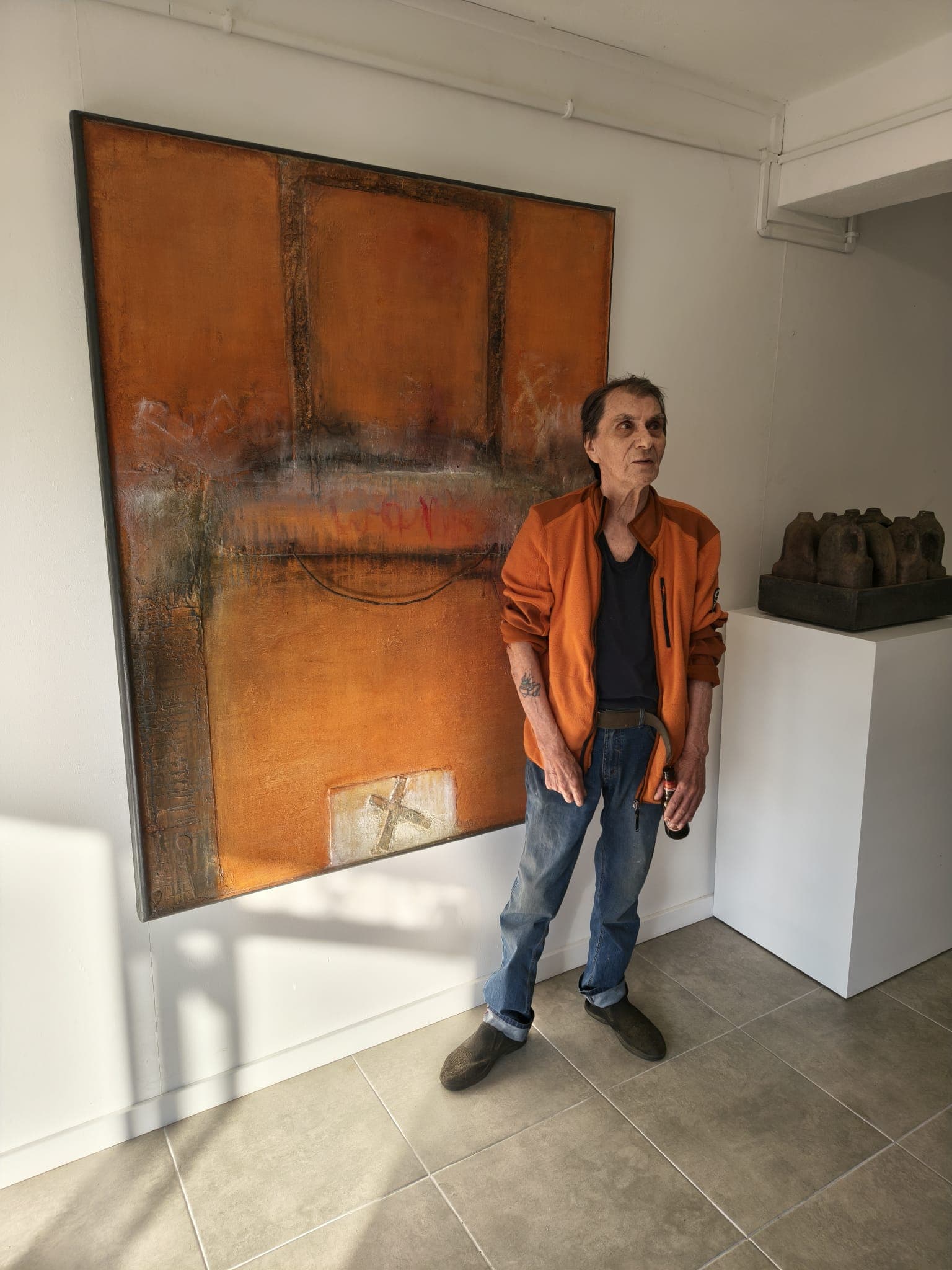 Roger Remaut with Orange Painting
